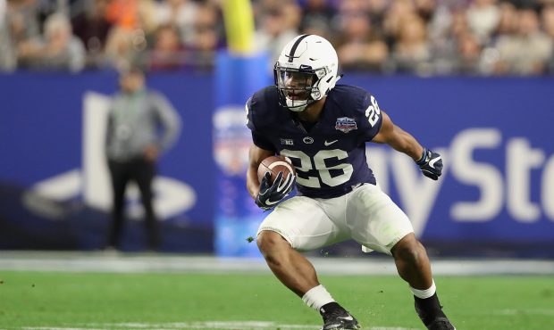 Running back Saquon Barkley #26 of the Penn State Nittany Lions rushes the football against the Was...