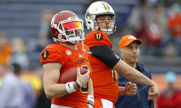 Baker Mayfield #6 of the North team and Josh Allen #17 warm up before the Reese's Senior Bowl at La...