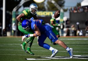 Tony Brooks-James #20 of the Oregon Ducks fumbles the ball under pressure from Leighton Vander Esch #38 of the Boise State Broncos during the first half of the Las Vegas Bowl at Sam Boyd Stadium on December 16, 2017 in Las Vegas, Nevada. Boise State won 38-28. (Photo by David Becker/Getty Images)