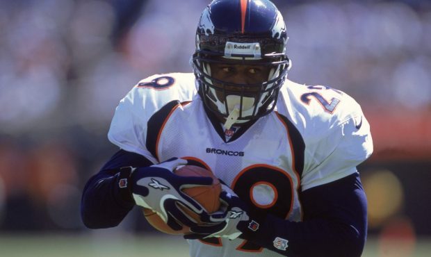 Howard Griffith #29 of the Denver Broncos holds the ball during the game against the Oakland Raider...