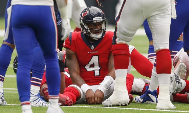 Deshaun Watson #4 of the Houston Texans sits on the field after fumbling the ball against the Buffa...