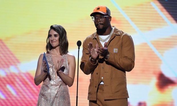 LOS ANGELES, CA - JULY 18:  Actor Alison Brie (L) and NFL player Von Miller speak onstage at The 20...