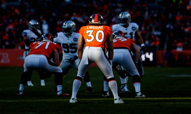 DENVER, CO - DECEMBER 29:  Running back Phillip Lindsay #30 of the Denver Broncos lines up against ...