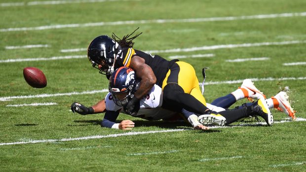 Bud Dupree #48 of the Pittsburgh Steelers forces a fumble after hitting Drew Lock #3 of the Denver Broncos during the first quarter at Heinz Field on September 20, 2020 in Pittsburgh, Pennsylvania. (Photo by Joe Sargent/Getty Images)