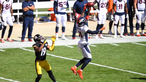 PITTSBURGH, PA - SEPTEMBER 20: Justin Simmons #31 of the Denver Broncos intercepts a pass intended for JuJu Smith-Schuster #19 of the Pittsburgh Steelers during the third quarter at Heinz Field on September 20, 2020 in Pittsburgh, Pennsylvania. (Photo by Joe Sargent/Getty Images)