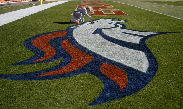 DENVER, CO - JANUARY 8 : Kelly Gratz of the turf team at Sports Authority Field at Mile High prepar...