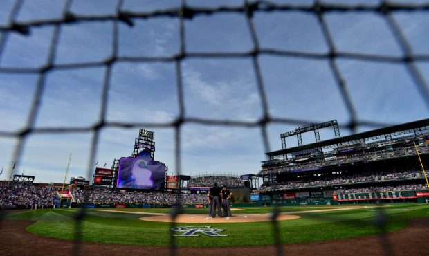 DENVER, CO - APRIL 5: A general view as the umpire crew meets before a game between the Colorado Ro...