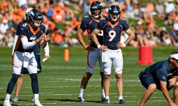 ENGLEWOOD, CO - AUGUST 11: Denver Broncos quaterbacks from left to right Drew Lock, #3, Joe Flacco,...