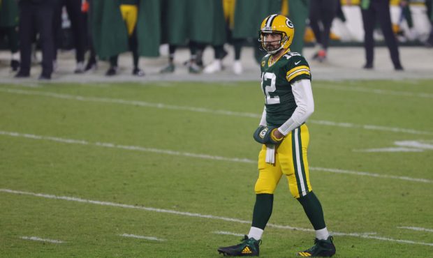GREEN BAY, WISCONSIN - DECEMBER 19: Aaron Rodgers #12 of the Green Bay Packers looks to the sidelin...