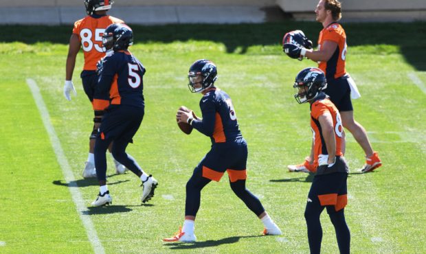ENGLEWOOD, CO - JUNE 1 : Denver Broncos quarterbacks Drew Lock (3) and Teddy Bridgewater (5) are in...