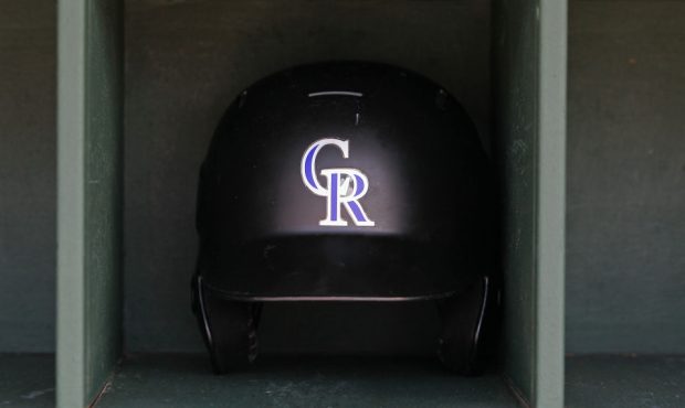 PHILADELPHIA, PA - MAY 18: A Colorado Rockies batting helmet in the dugout before a game against th...