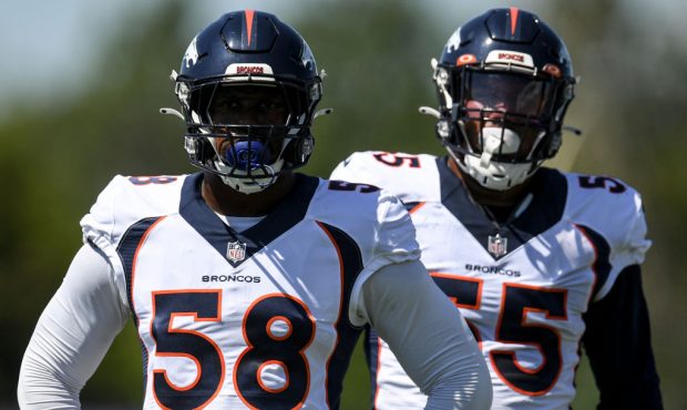 EAGAN, MN - AUGUST 11: Von Miller (58) of the Denver Broncos and Bradley Chubb (55) work out with f...