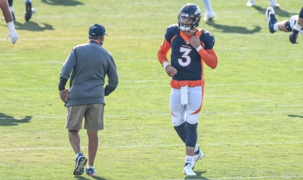 ENGLEWOOD, CO - AUGUST 20: Quarterback Drew Lock #3 of the Denver Broncos has a word with head coac...