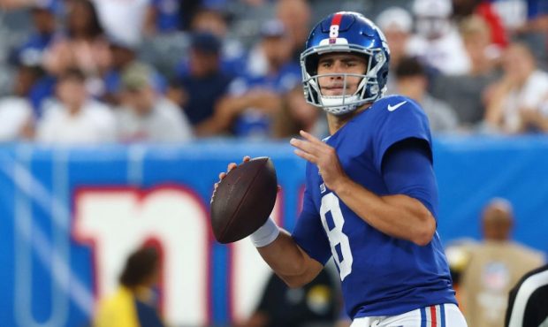 EAST RUTHERFORD, NEW JERSEY - AUGUST 29: Daniel Jones #8 of the New York Giants looks to pass the b...