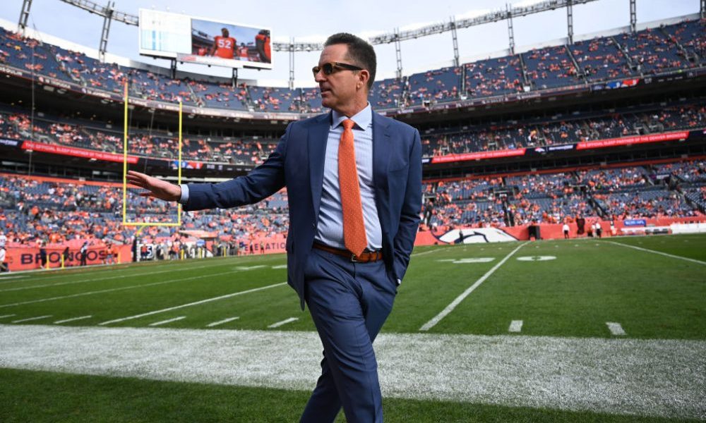DENVER, COLORADO - NOVEMBER 28: Denver Broncos general manager George Paton walks out on the field before the game at Empower Field at Mile High on November 28, 2021 in Denver, Colorado. The Denver Broncos take on Los Angles Chargers. (Photo by RJ Sangosti/MediaNews Group/The Denver Post via Getty Images)