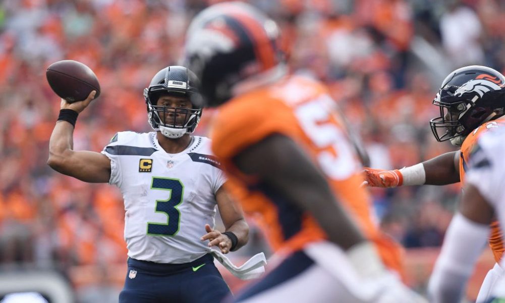 DENVER, CO - SEPTEMBER 9: Russell Wilson (3) of the Seattle Seahawks throws during the third quarte...