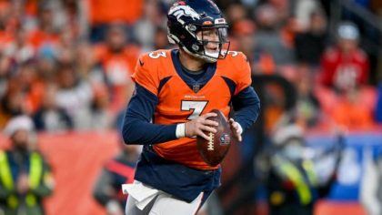 DENVER, CO - DECEMBER 19: Denver Broncos quarterback Drew Lock (3) rolls out of the pocket during a...