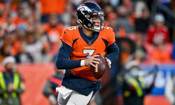 DENVER, CO - DECEMBER 19: Denver Broncos quarterback Drew Lock (3) rolls out of the pocket during a...