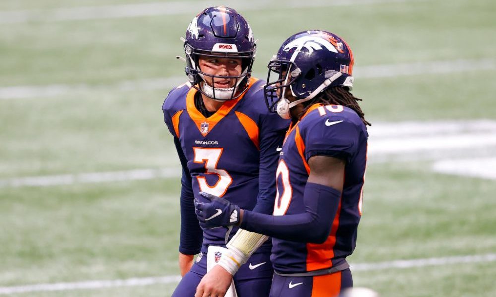 ATLANTA, GEORGIA - NOVEMBER 08: Drew Lock #3 of the Denver Broncos talks with Jerry Jeudy #10 during the fourth quarter against the Atlanta Falcons at Mercedes-Benz Stadium on November 08, 2020 in Atlanta, Georgia. (Photo by Kevin C. Cox/Getty Images)