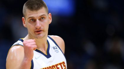 NEW ORLEANS, LOUISIANA - DECEMBER 08: Nikola Jokic #15 of the Denver Nuggets reacts against the New...