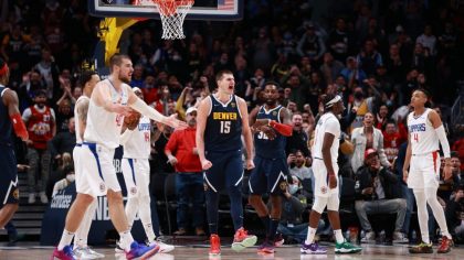 DENVER, CO - JANUARY 19: Nikola Jokic #15 of the Denver Nuggets reacts to a play against the Los An...