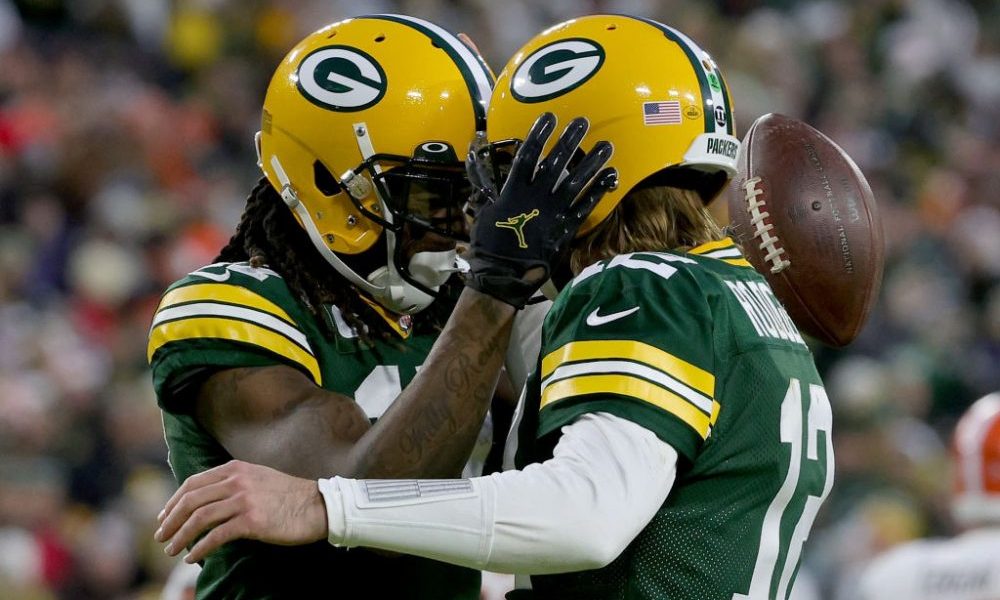 GREEN BAY, WISCONSIN - DECEMBER 25: Davante Adams #17 and Aaron Rodgers #12 of the Green Bay Packer...