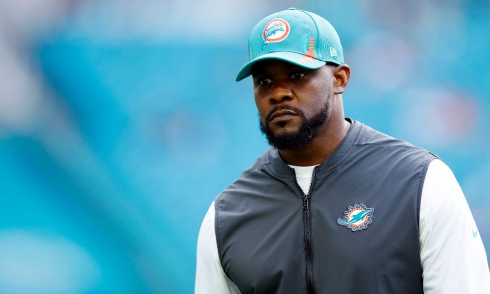 MIAMI GARDENS, FLORIDA - JANUARY 09: Head coach Brian Flores of the Miami Dolphins walks the field prior to the game against the New England Patriots at Hard Rock Stadium on January 09, 2022 in Miami Gardens, Florida. (Photo by Michael Reaves/Getty Images)